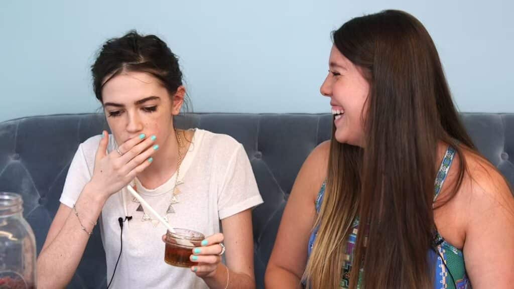 The Bustle team consuming vodka infused gummy bears.